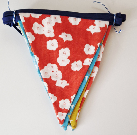 Preview: Wimpelkette Türkis-Safran-Koralle aus BIO Baumwolle