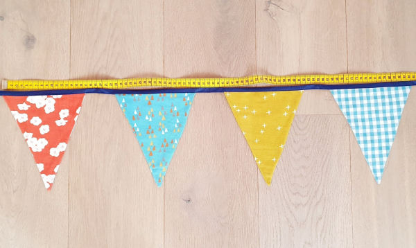 Wimpelkette Türkis-Safran-Koralle aus BIO Baumwolle